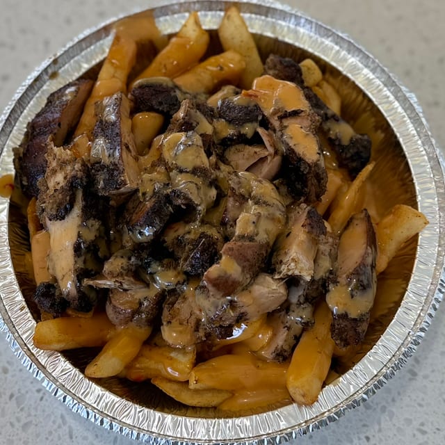 Jerk Chicken Loaded Fries.