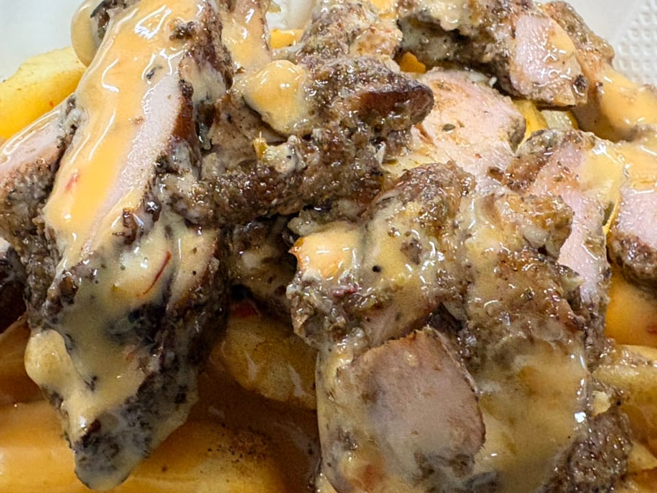 Jerk Chicken Loaded Fries.